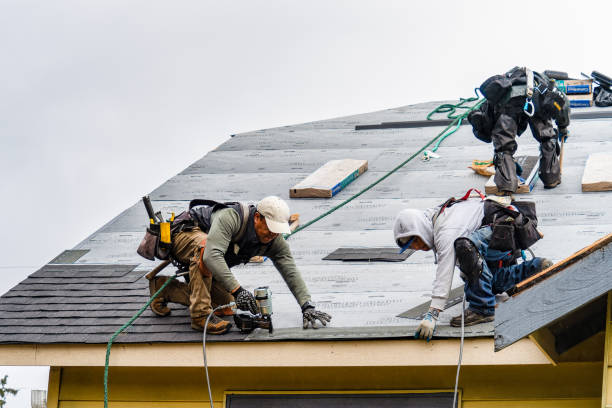 Professional Gutter Installation technician working in Corona, NY
